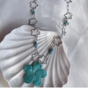 Turquoise and Silver metal flower Necklace